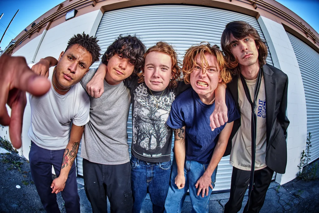 XCOMM, all five band members, Los Angeles 2026
