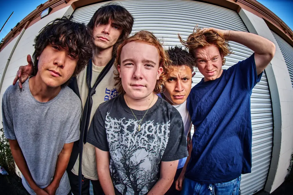 XCOMM, all five band members, Los Angeles 2026